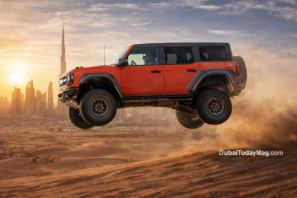 Ford Bronco Raptor driving through desert sand dunes